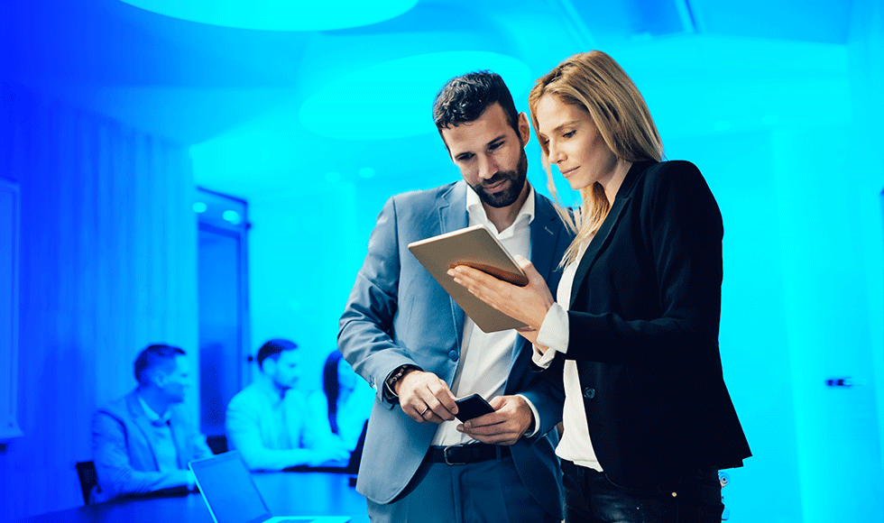 ai and automation two people active discussion hero