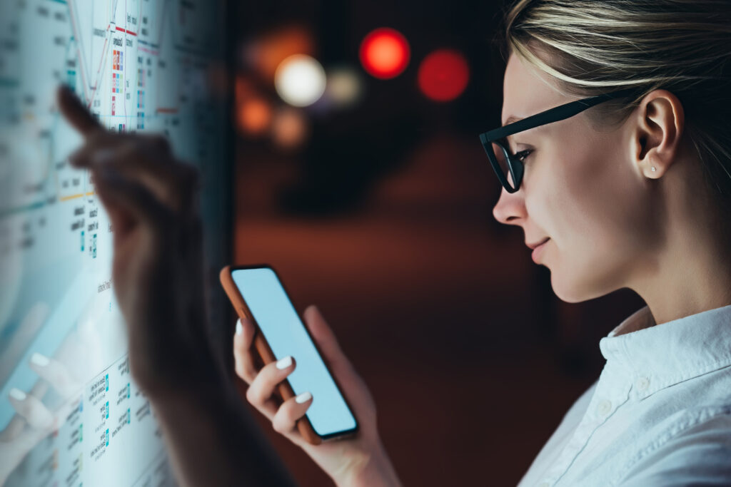 woman looking at phone