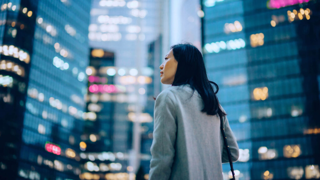 Effective Troubleshooting and Fixes for SMBs Using AI Automation 2 editorial 1301353296 asian woman outisde office 2880x1620